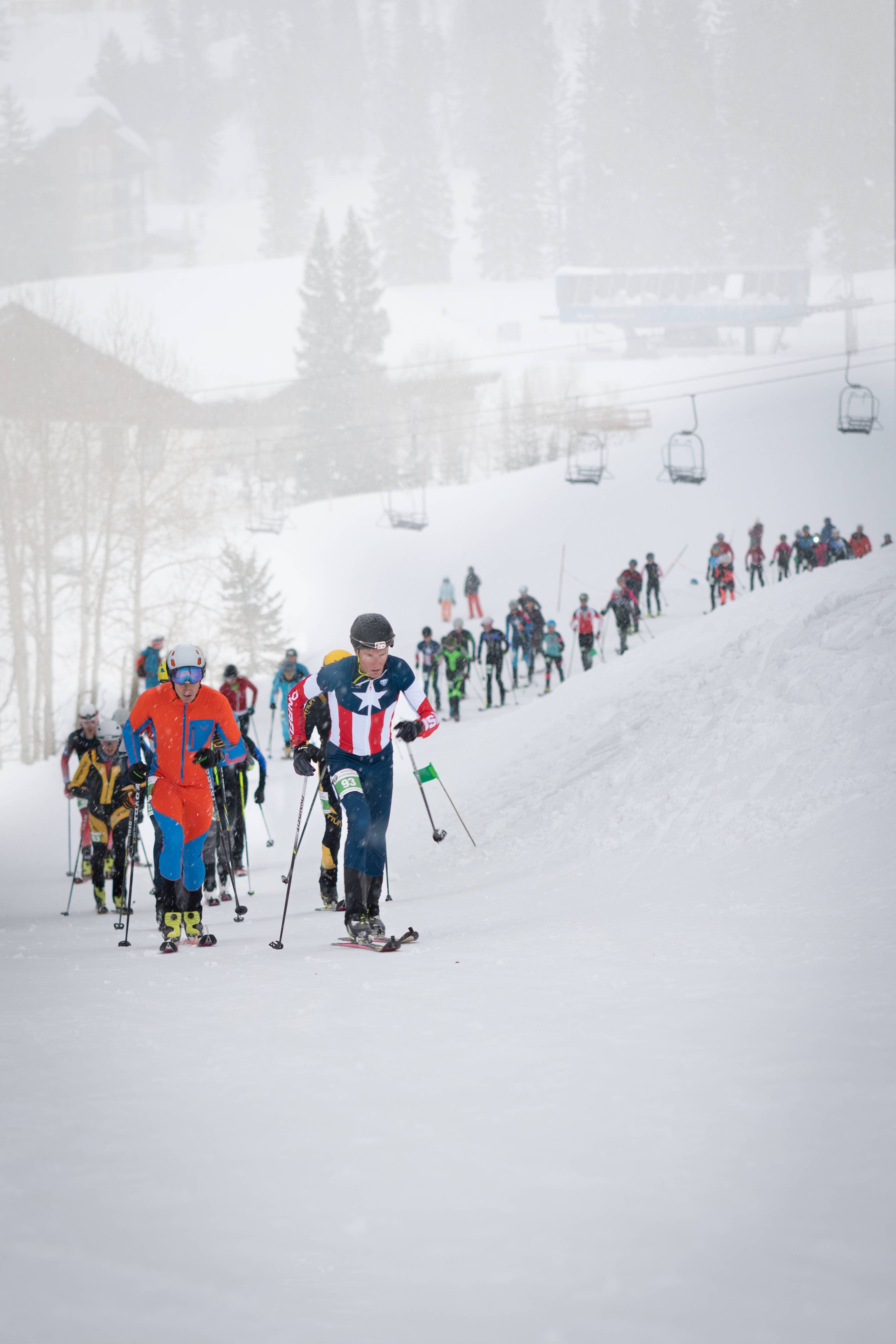 Racers skiing up the course